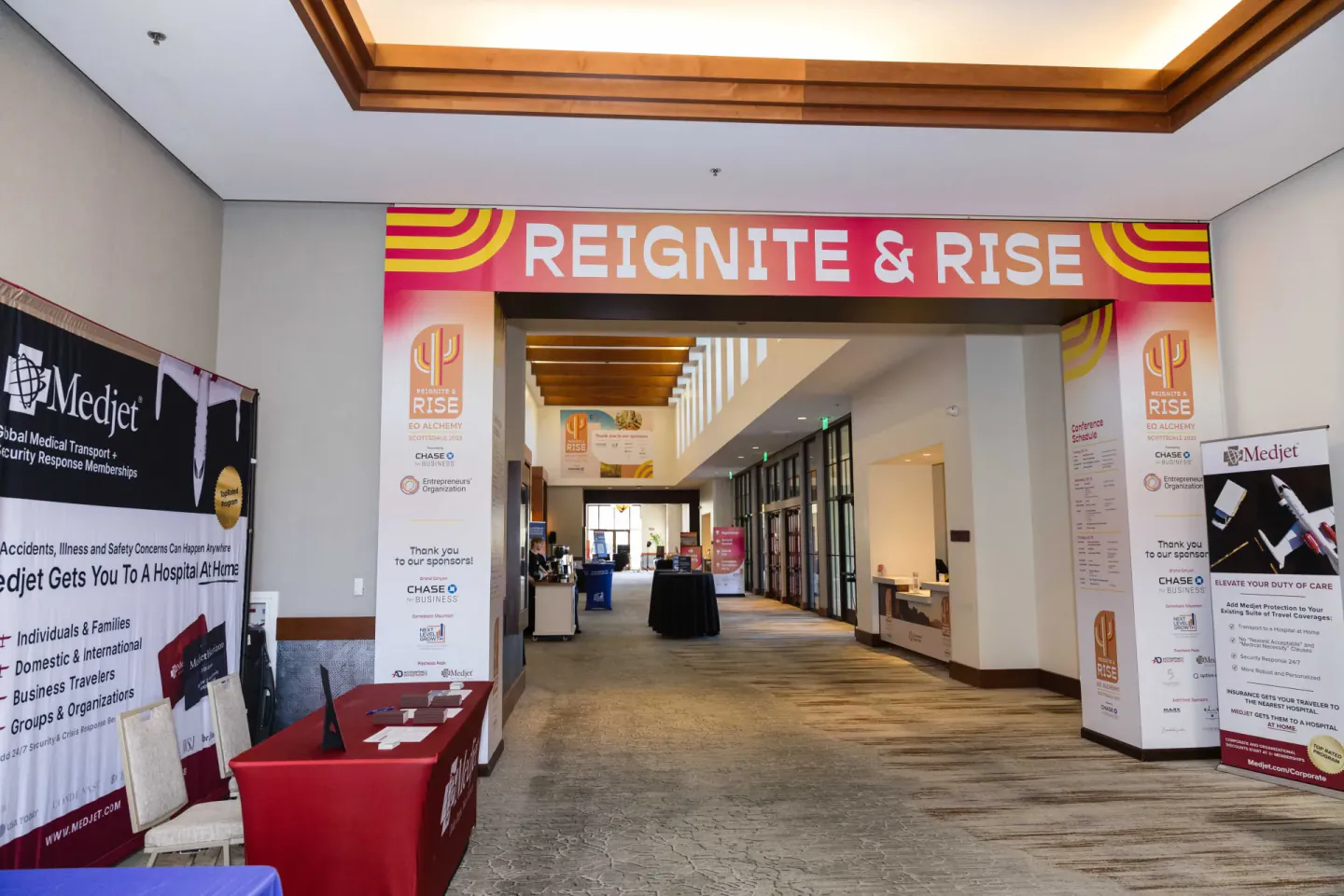 Reignite and Rise entrance arch over the sponsor concourse at EO Alchemy, Scottsdale, 2025