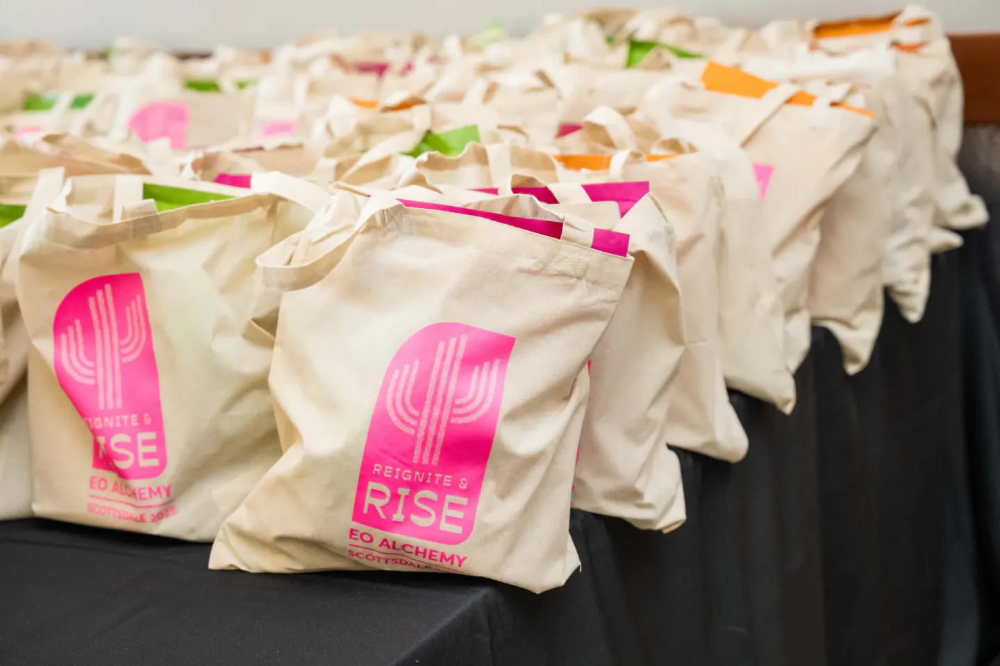 Reignite and Rise tote bags at EO Alchemy, Scottsdale, 2025