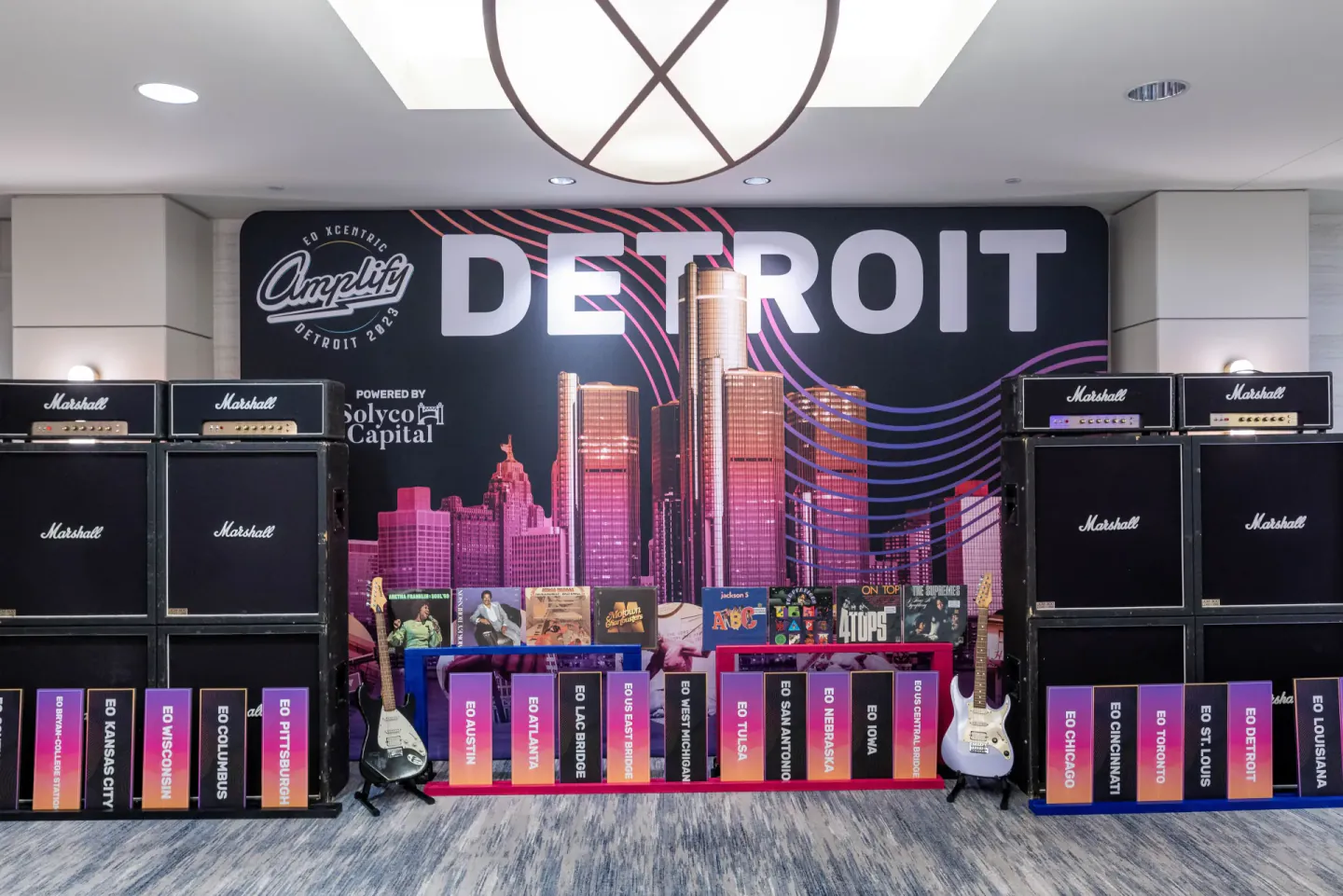 Amplify Detroit photo wall with chapter markers, 2023
