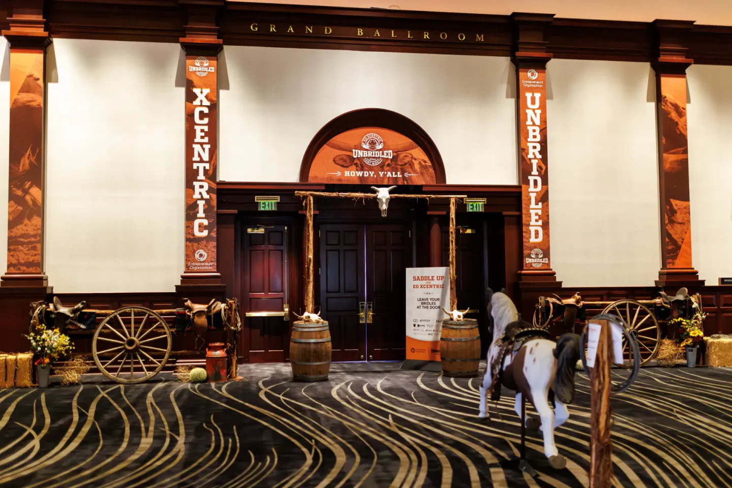 Unbridled ballroom entrance branding at EO XCentric, Fort Worth, 2024