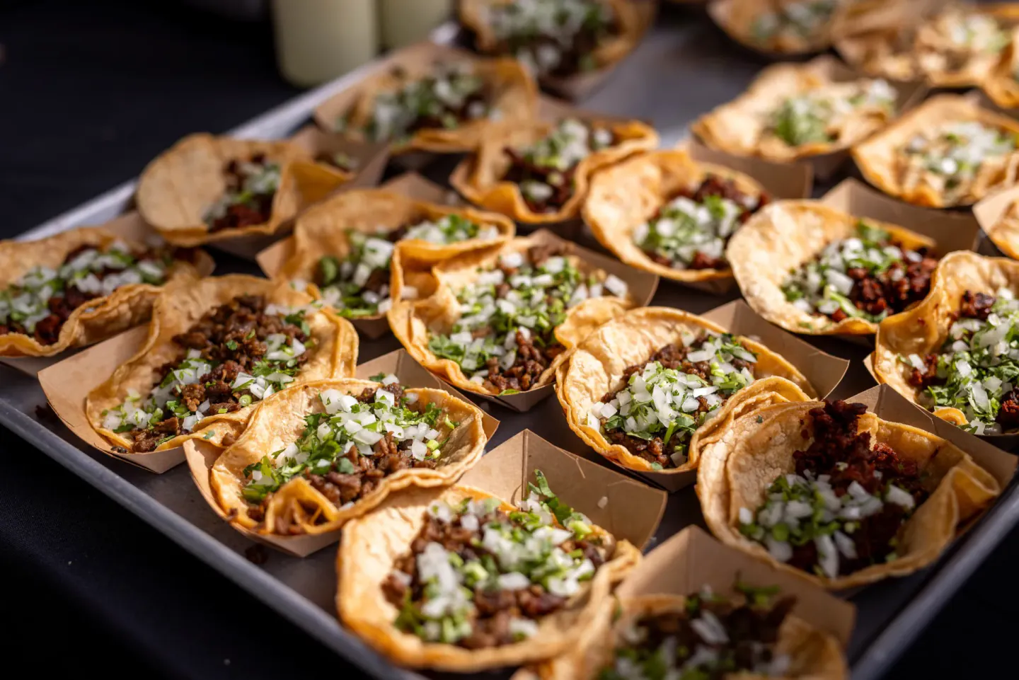 Taco bites plated for a reception at EO XCentric, Detroit, 2023