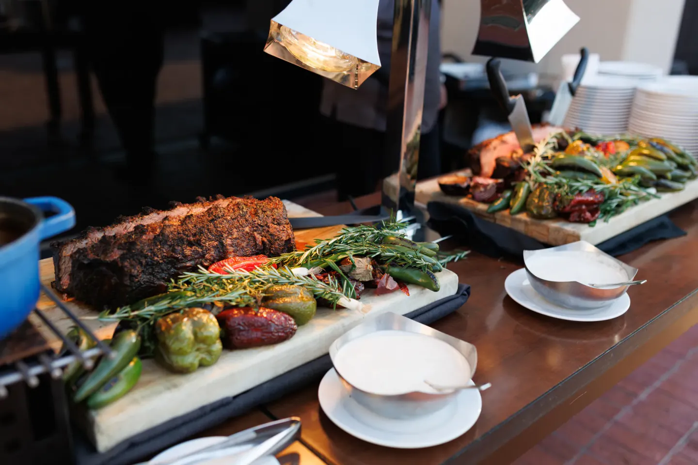 Carving station with roast and grilled vegetables at EO XCentric, Fort Worth, 2024