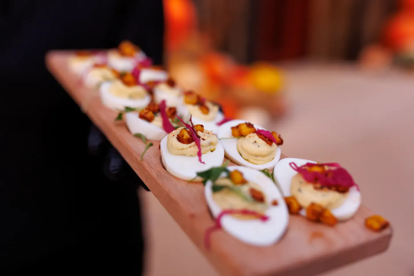Deviled eggs on a serving board at EO XCentric, Fort Worth, 2024