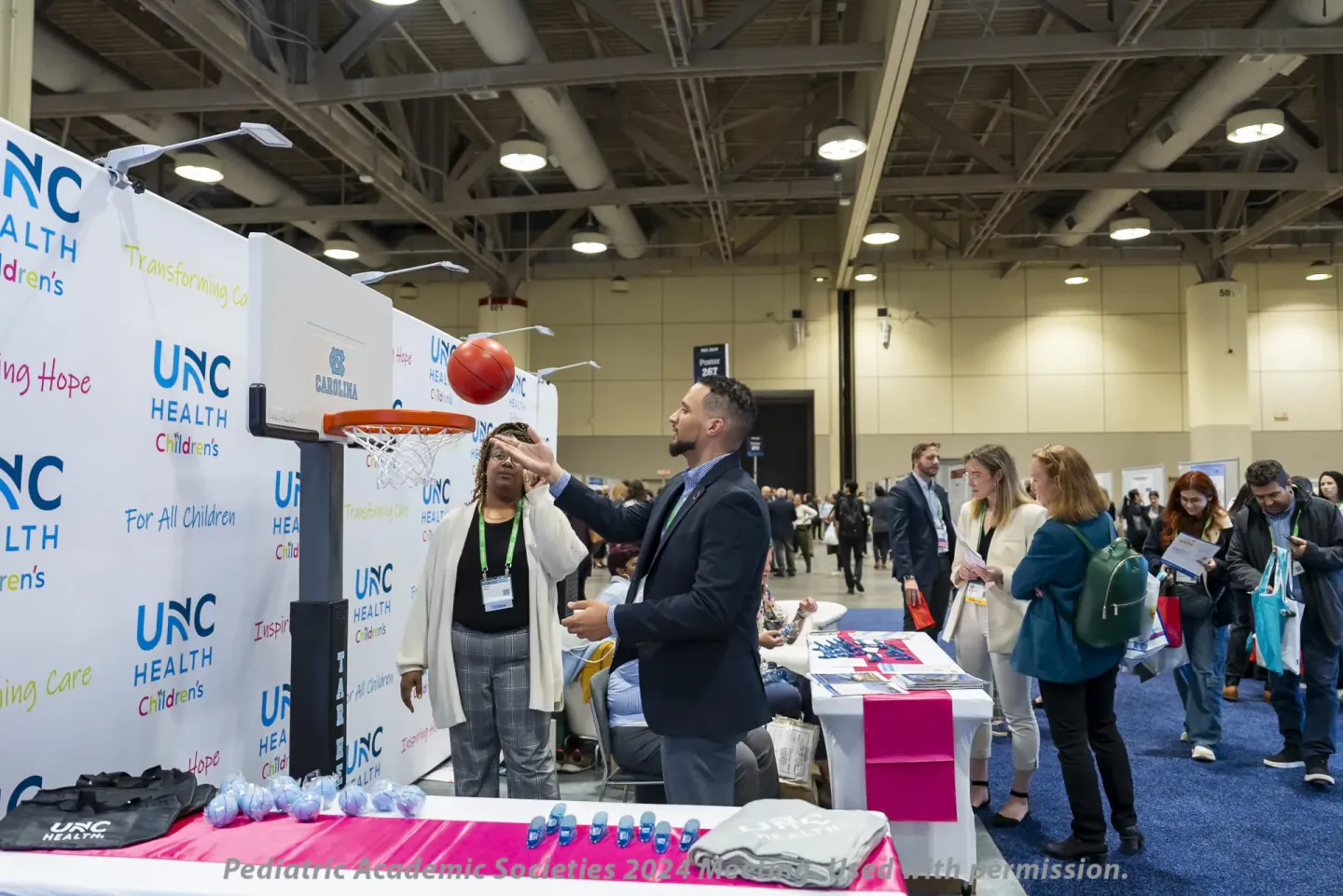 Booth activation on the exhibit floor at PAS 2024, Toronto