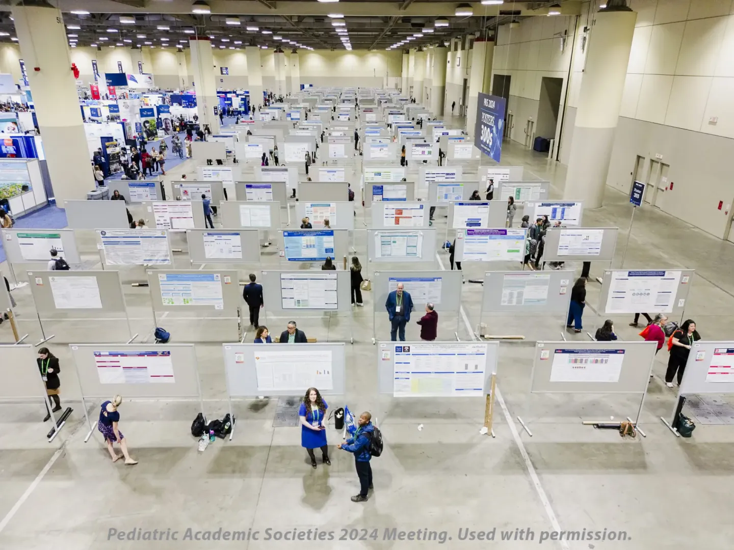 Poster session on the exhibit floor at PAS 2024, Toronto