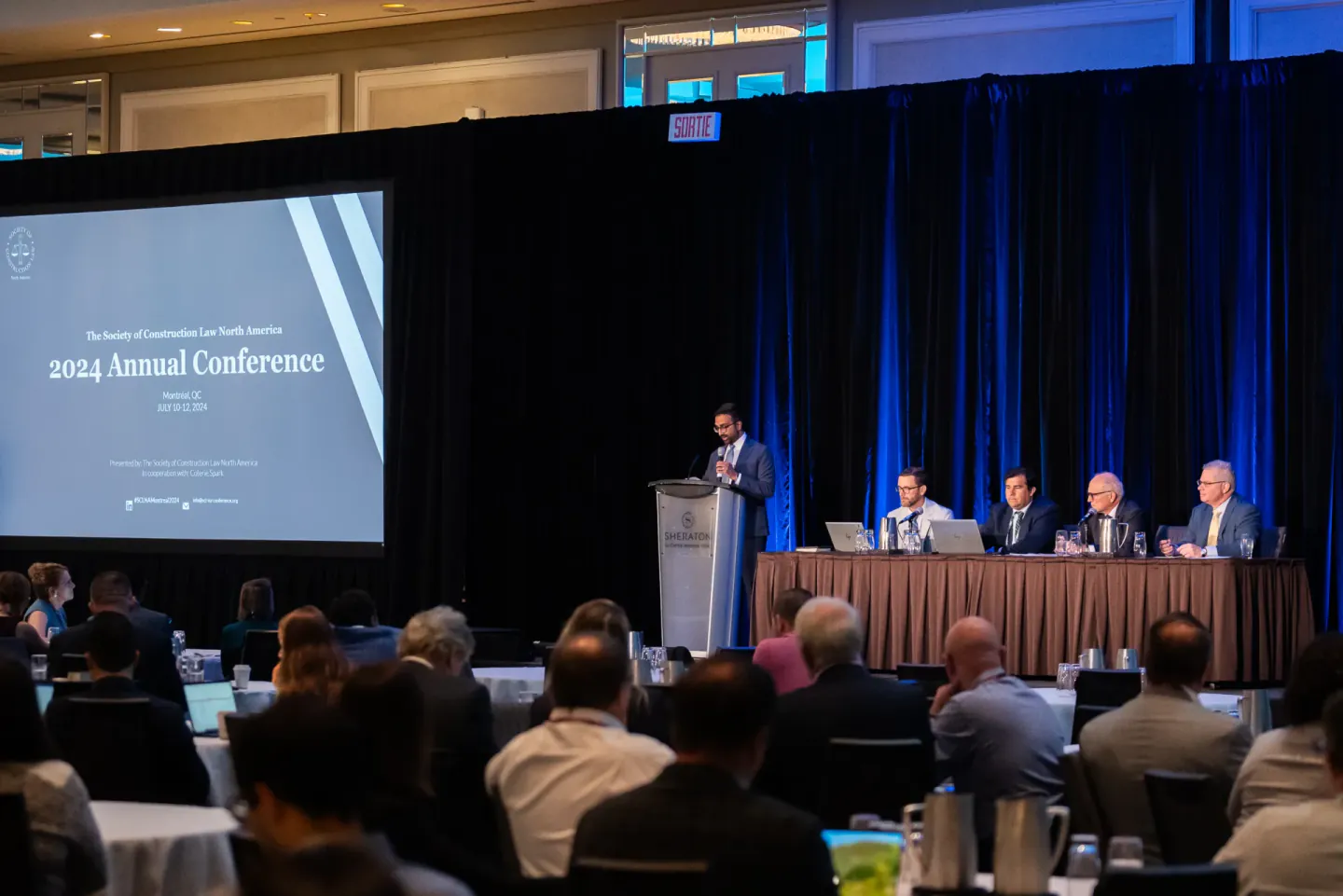 Panel and podium at the SCL North America Annual Conference, Montreal, 2024