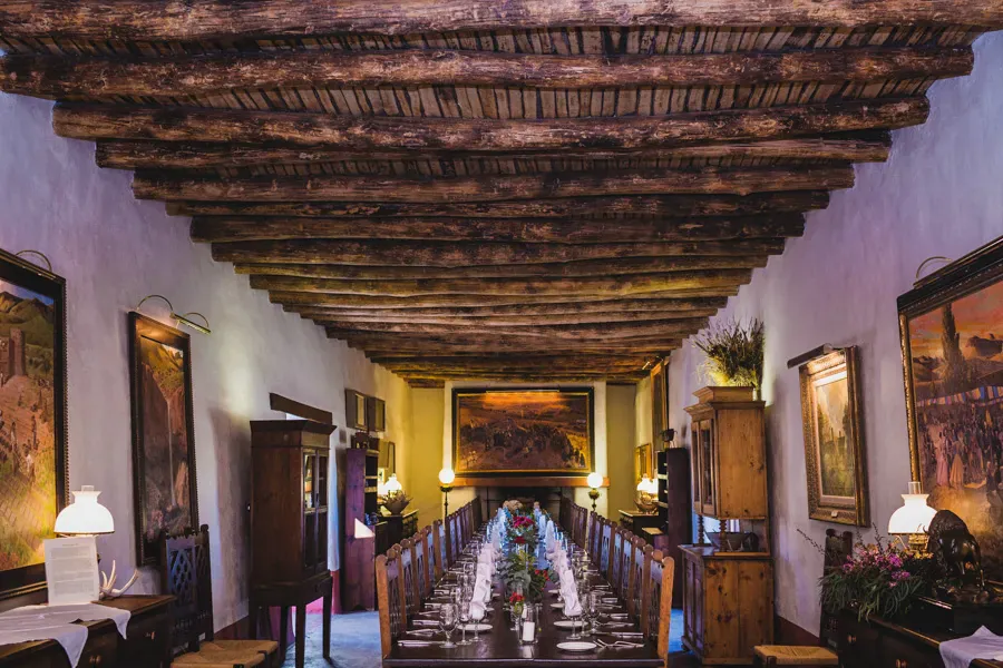 Long banquet table in a historic adobe dining room