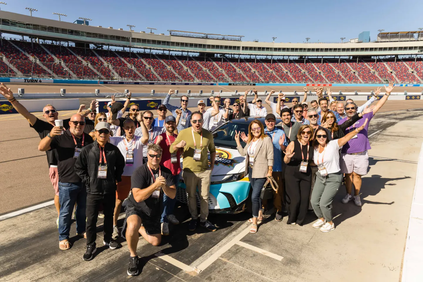 Group photo on pit road at the raceway during EO Alchemy, Scottsdale, 2025