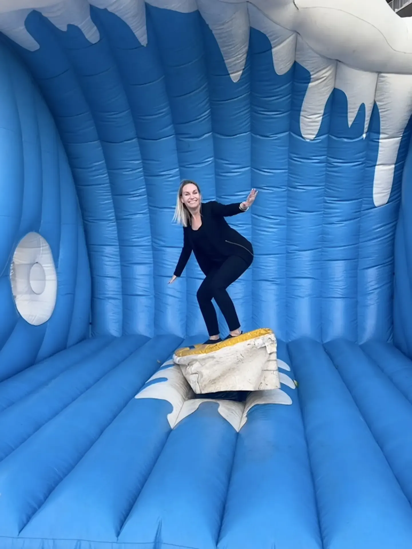 On-site staff on an inflatable surfboard activation at EO NERVE, Virginia Beach, 2022
