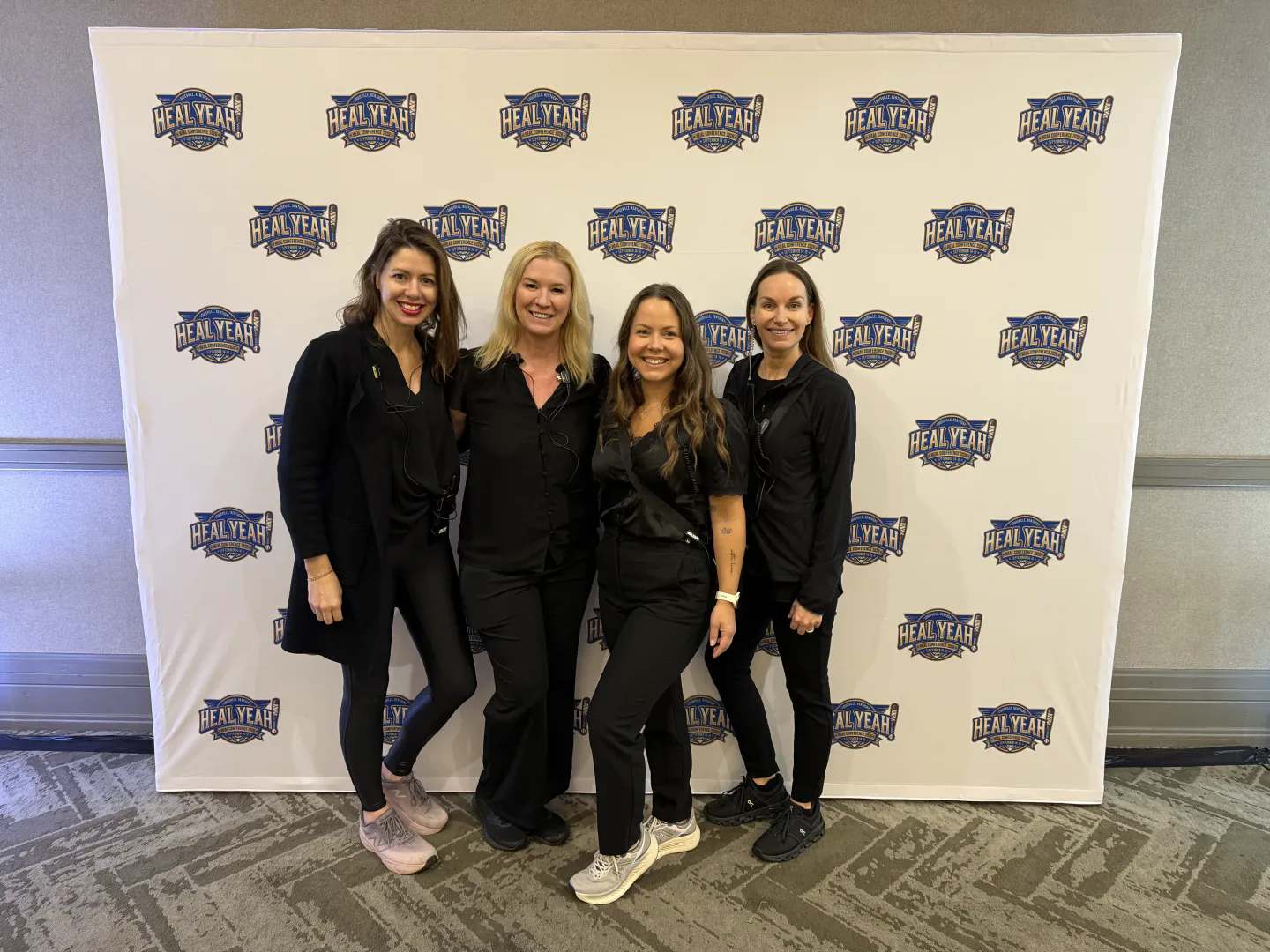 Coterie Spark on-site team at the HEAL Yeah Conference step-and-repeat in Louisville, Kentucky