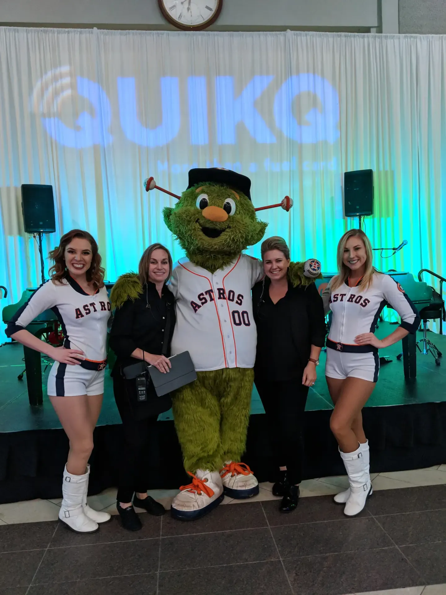 On-site staff with the Houston Astros mascot at a QUIKQ event, 2018