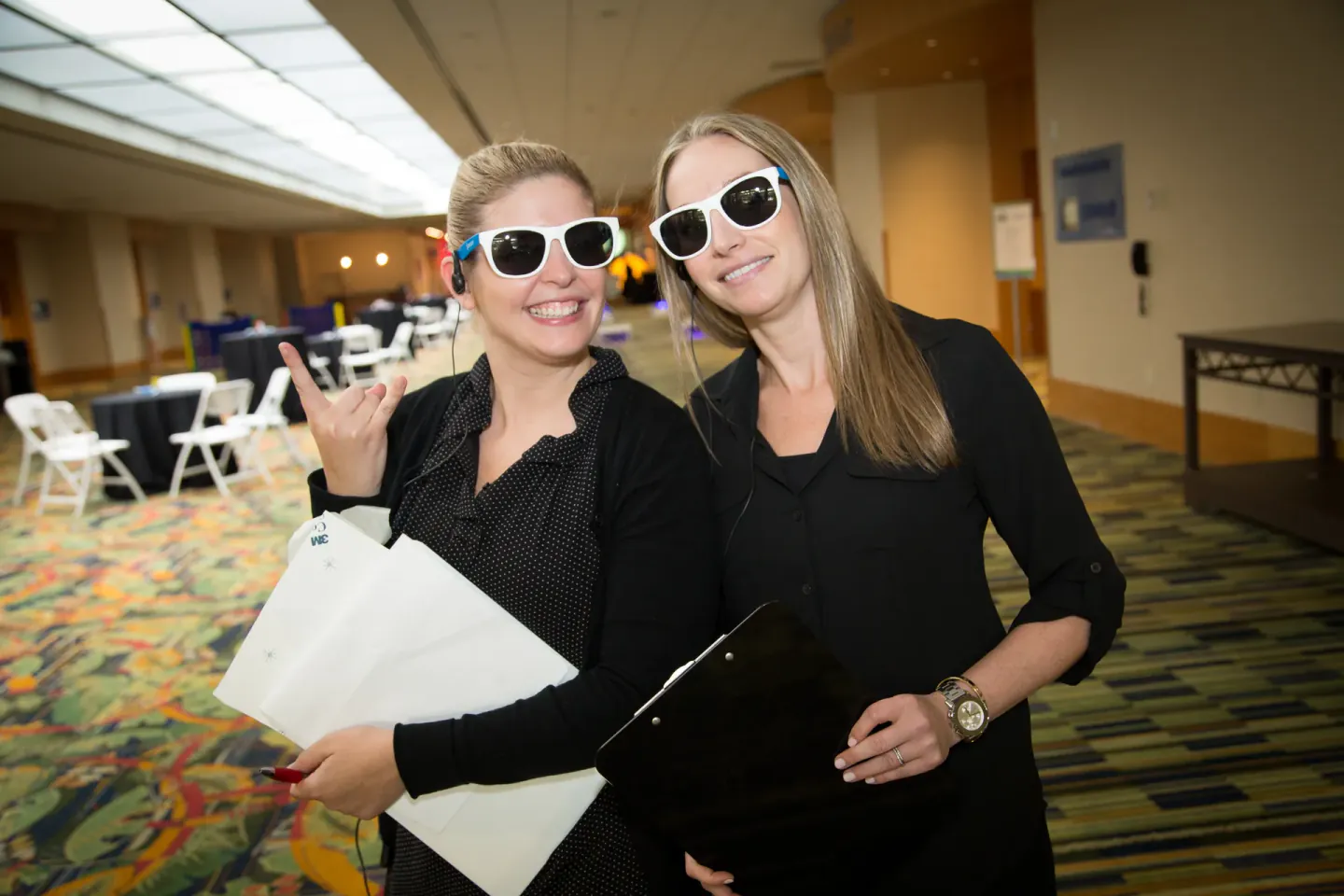 On-site staff wearing 3D glasses backstage at TMW Transforum 2015