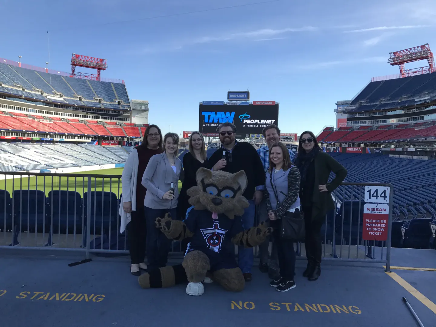 On-site team with the Titans mascot at Nissan Stadium during TMW Transforum, Nashville