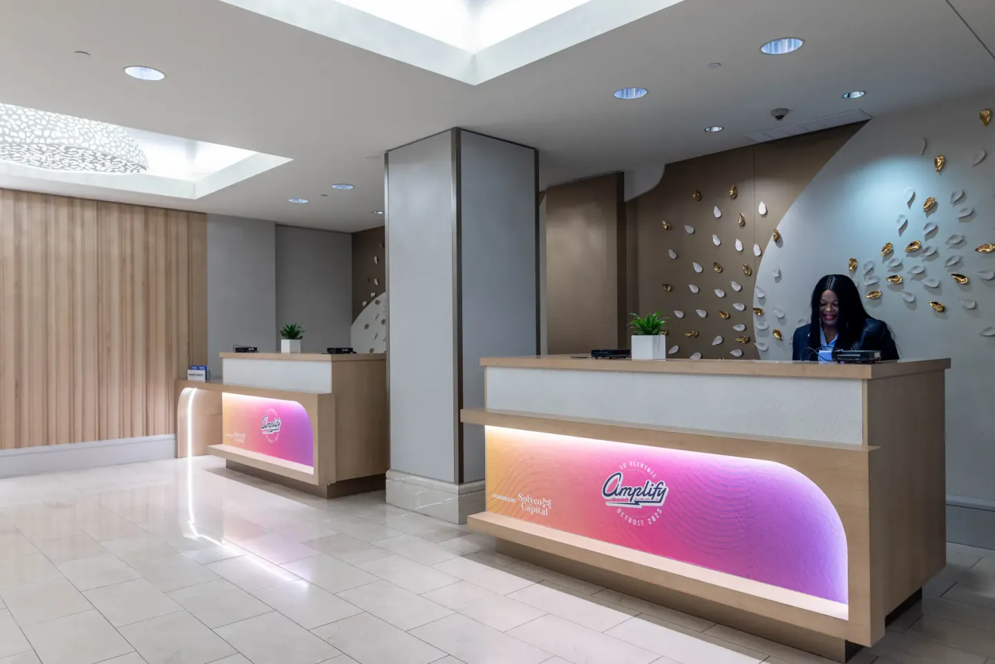 Branded Amplify check-in desks at EO EXCentric, Detroit, 2023