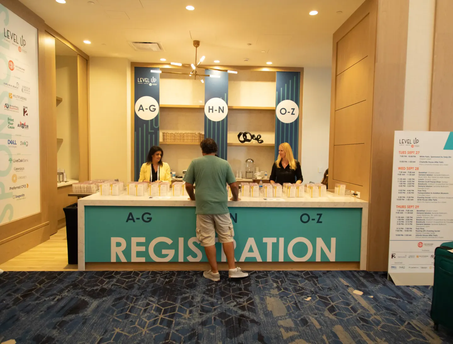 A-G, H-N and O-Z registration desks at EO NERVE, Virginia Beach, 2022