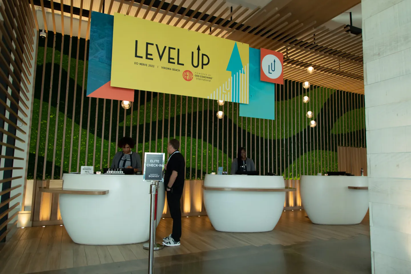 Level Up branding over hotel check-in at EO NERVE, Virginia Beach, 2022