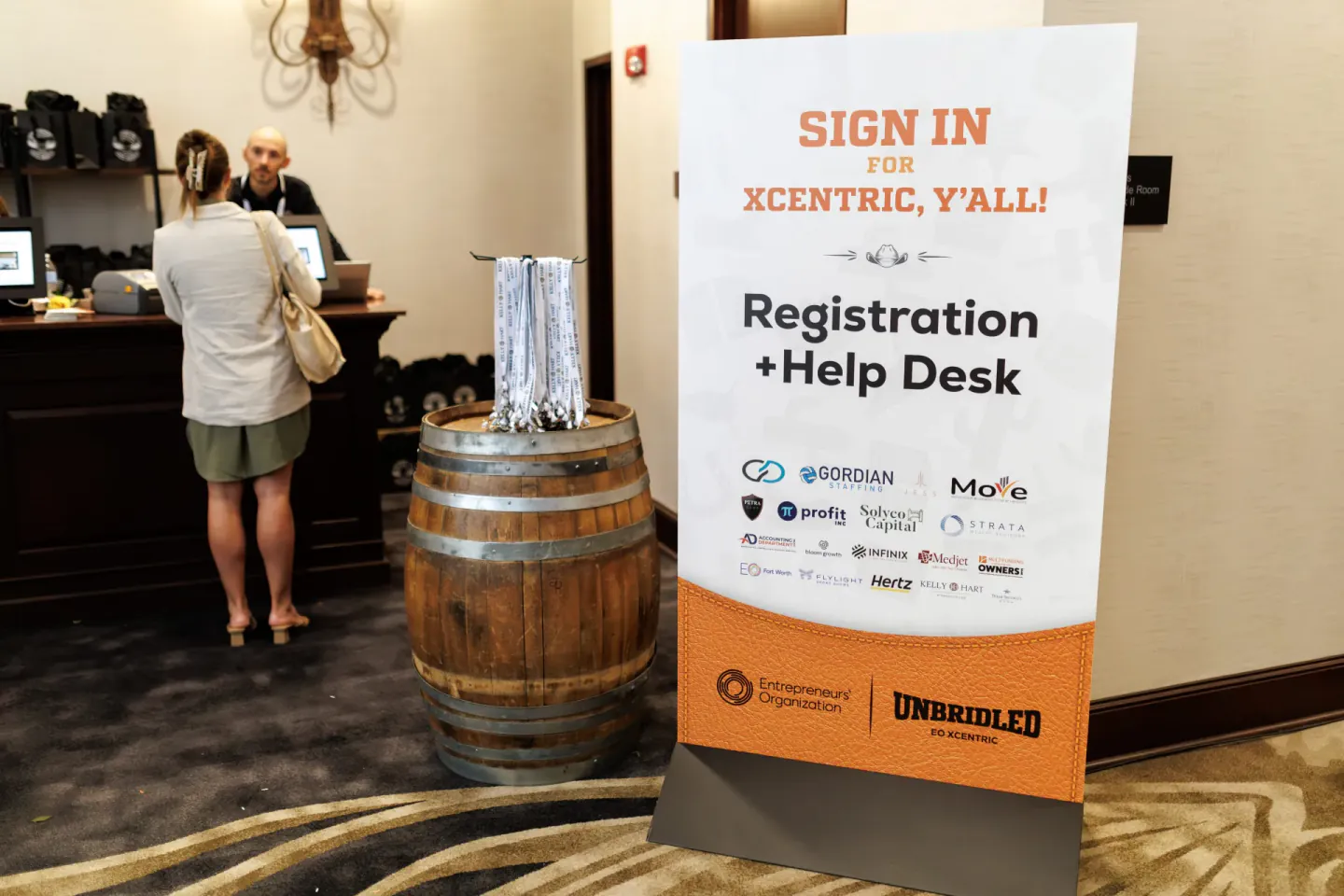 Registration and help desk sign-in at EO XCentric, Fort Worth, 2024