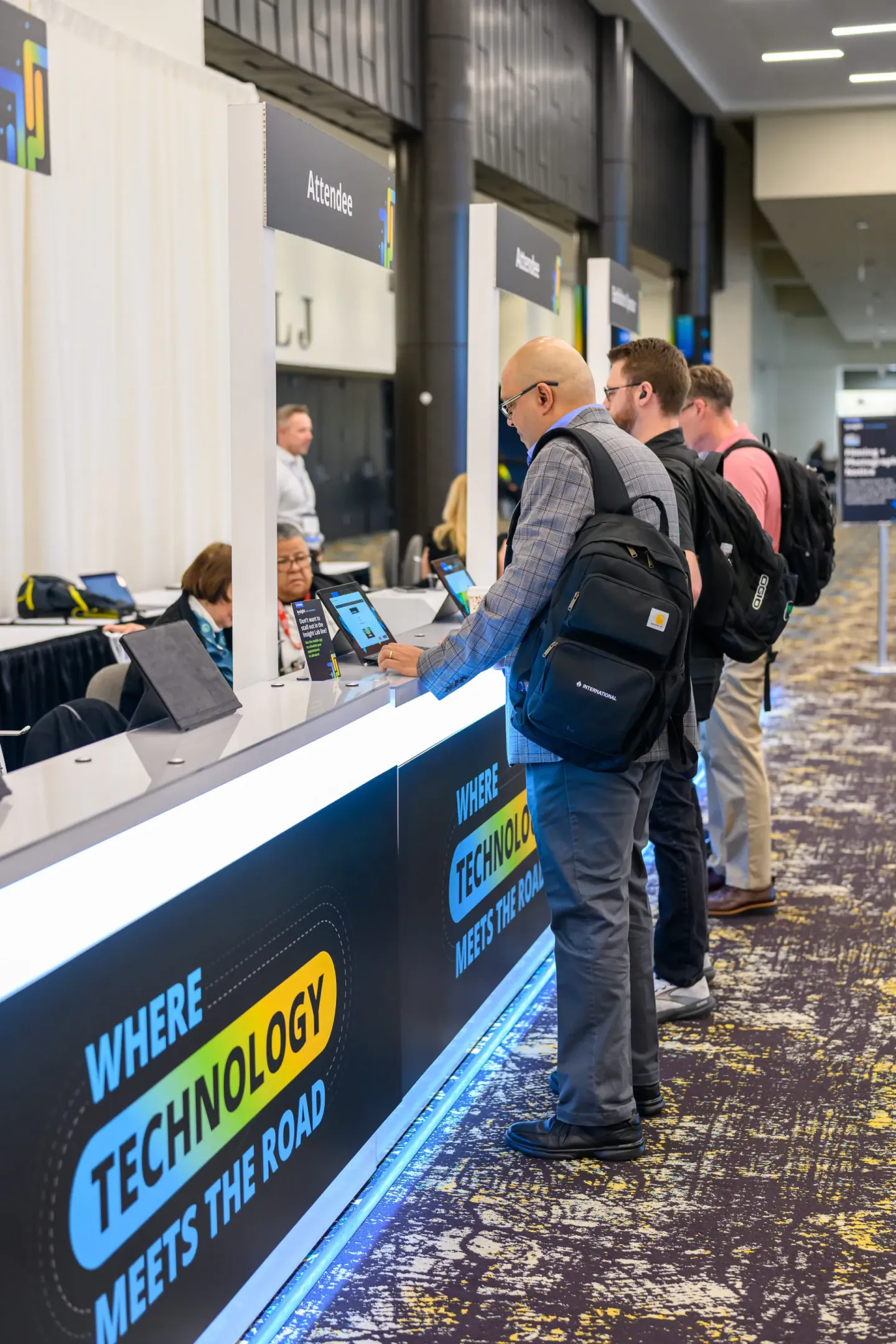 Attendees in line at Trimble Insight registration, 2025