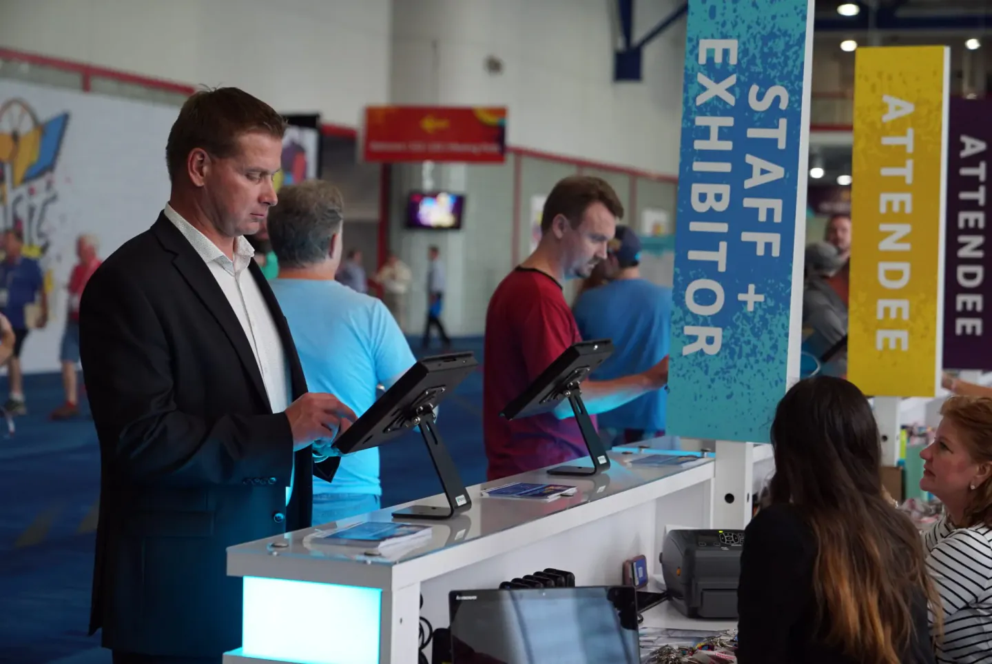Attendee checking in at a Trimble Insight kiosk, Houston, 2018